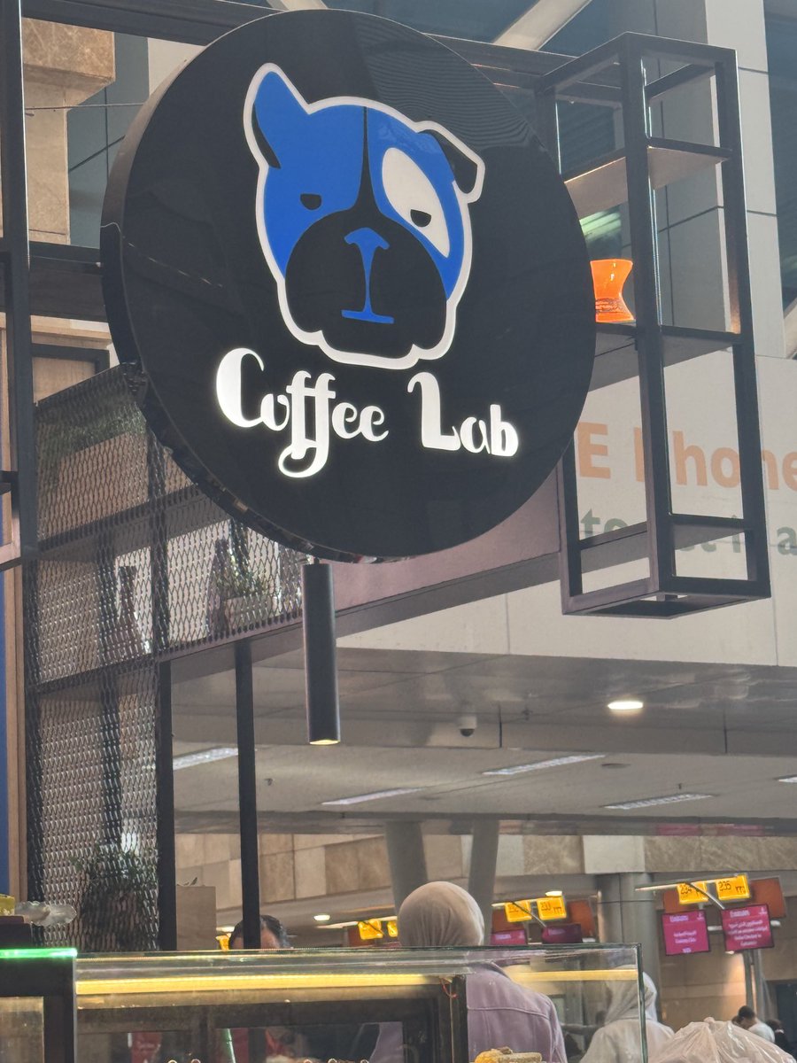 Is it supposed to be a Labrador?

Or is the bulldog a professor at a Coffee Laboratory?