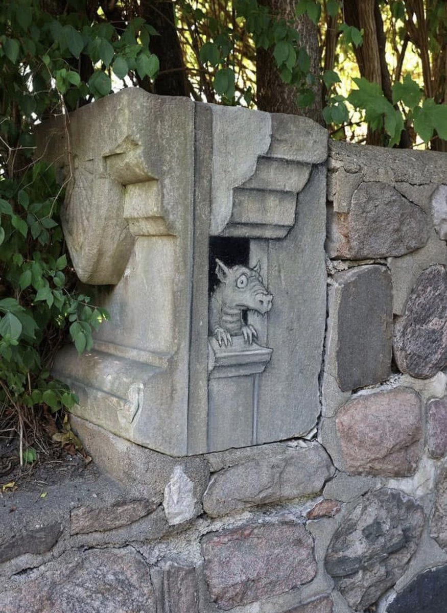 "To his never-ending embarrassment, Glen was given the lowest gargoyle assignment because he has a fear of heights." 

🎨Chalk street art by David Zinn.