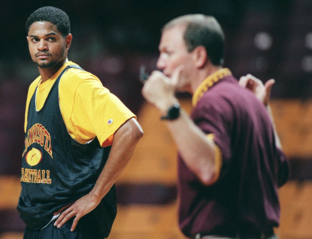 University of Minnesota forward John-Blair “J.B.” Bickerstaff listens as Golden Gophers coach Dan Monson instructs at practice. Bickerstaff averaged 10.9 points, 6.1 rebounds and 4.0 assists as a senior in 2000-01. Now coach of the Detroit Pistons.
