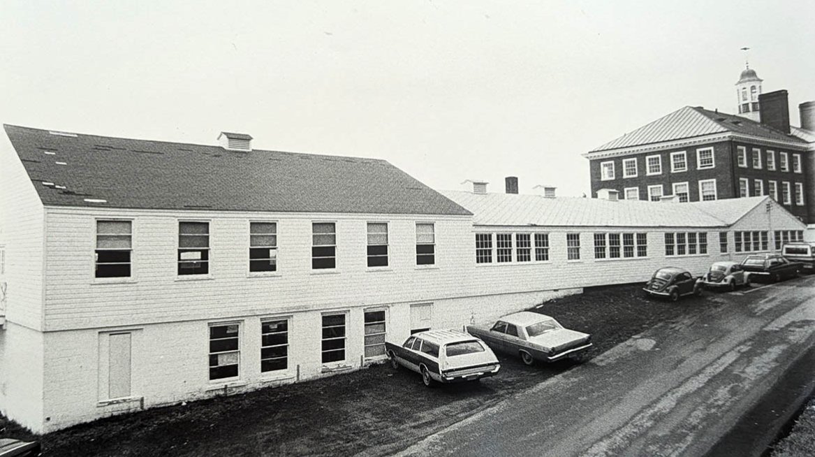 HartwickCollege's tweet photo. Cardboard Alley, a prefab WWII-era building, built in 1946 to meet postwar enrollment needs. It housed faculty offices, classrooms, and a small theater, inspiring the theater club’s name. Demolished in 1973, it lives on in Hartwick College Paul F. Cooper, Jr. Archives. #hartwick https://t.co/nnu9u1qchj