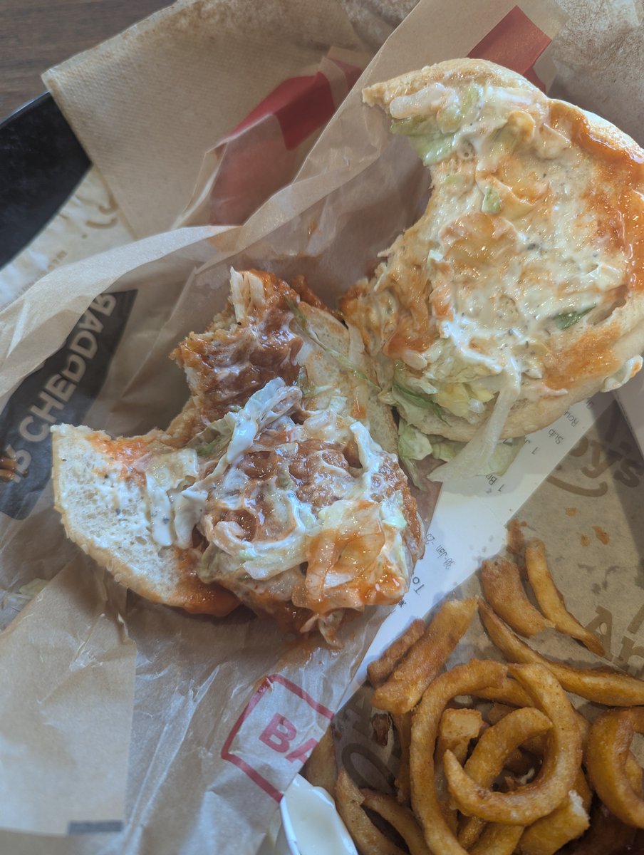 CJkoolio's tweet photo. If anyone is wondering. The @Arbys "jr. Buffalo" sandwich is two small nuggets on a burger bun. How is this allowed? https://t.co/euPM16pRaw