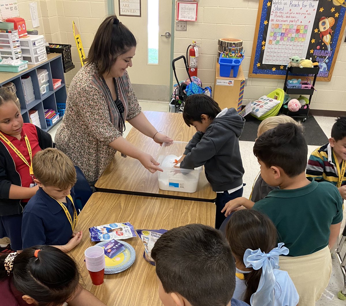 Ms. Barreneche’s class made snow today and they loved every minute describing what it feels like with strong adjectives! #SPEFunInFirst