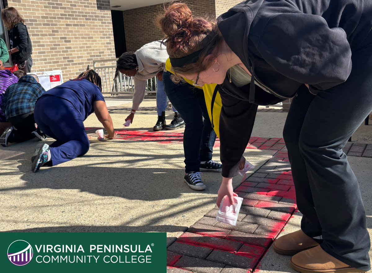 VPCCva's tweet image. On Tuesday and Wednesday, students from our Hampton and Historic Triangle Campuses took part in the #RedSandProject — which is a program that raises awareness about human trafficking, modern slavery, and exploitation. Students filled cracks and decorated campus sidewalks.