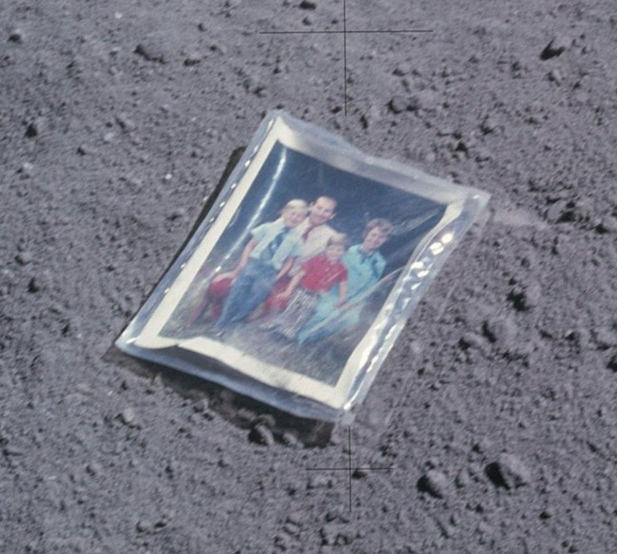 BlindIndex's tweet image. Charles Duke, astronaut, left a family photo on the moon during the Apollo 16 mission (1972). He took this photo as evidence

on the back side of the photo a message reads &quot;This is the family of astronaut Charlie Duke from planet Earth who landed on the moon on April 20, 1972.&quot;