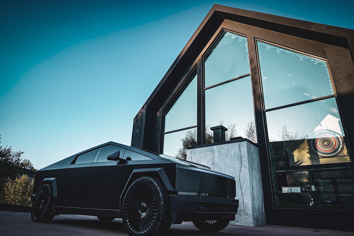 RonnieRadke's tweet photo. And I don’t understand yall talking shit about me owning a cybertruck when it’s HARD AF looking and faster than a Lamborghini. Shit has most insane turn radius due to back wheels also turning. best sound system too. this shit is hard as nails https://t.co/2FKiPwuhHt