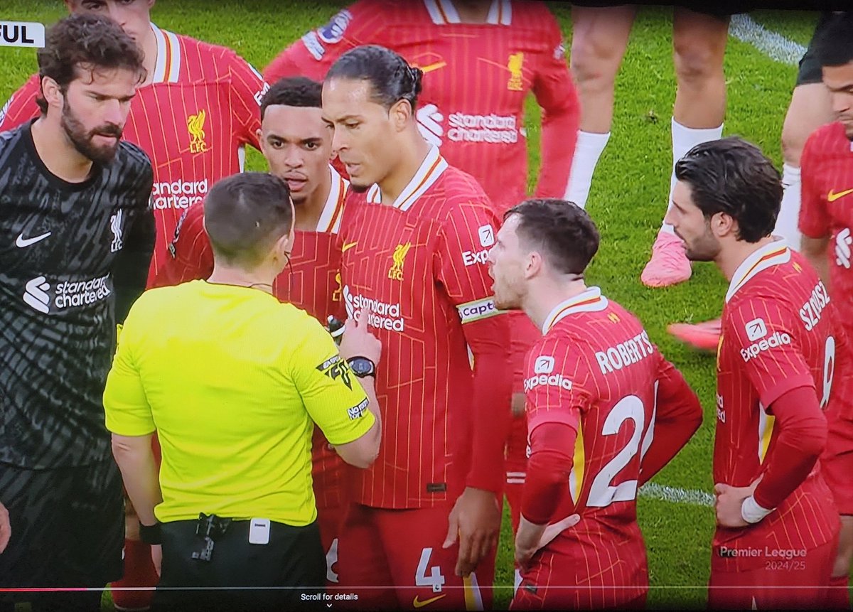 Meanwhile, here's Liverpools 7 captains having a chat with the referee....