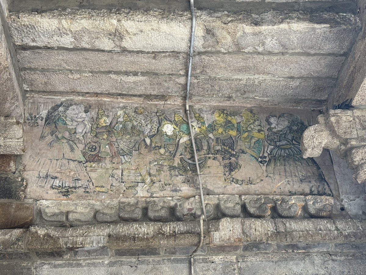 _agnel_'s tweet photo. On a recent visit to Thiruvarur Thiyagaraja Swamy temple, I found this mural on the ceiling of the corridor. It probably depicts the goddess with two angels holding a child. 

Interesting, wonder any background story to these. Could be a Nayaka period mural? https://t.co/9tQux0EbMx