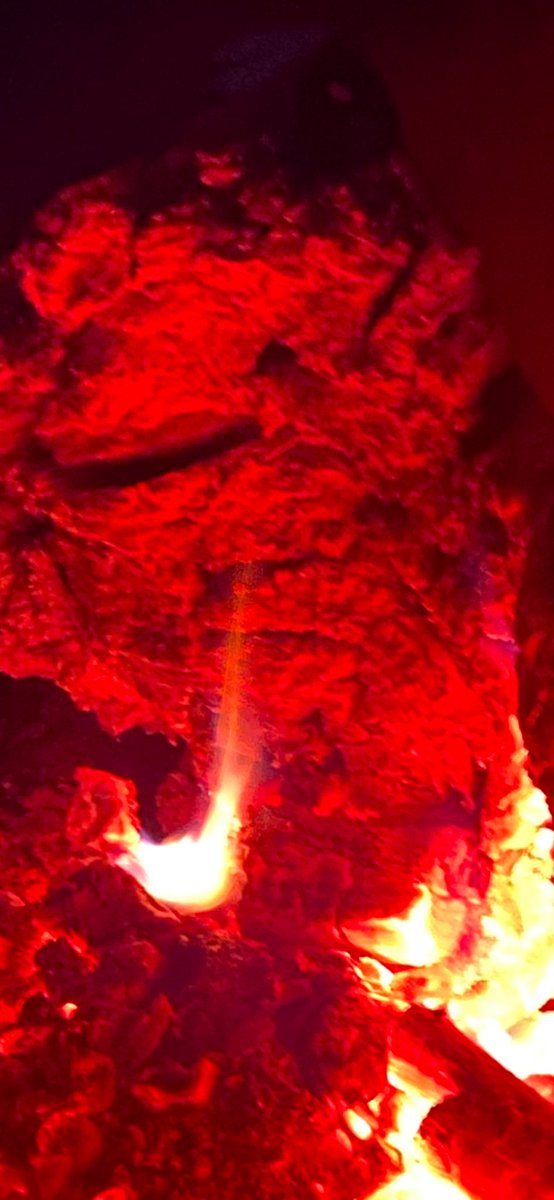 Is it just me or does anyone else see a face in that log in the fire?