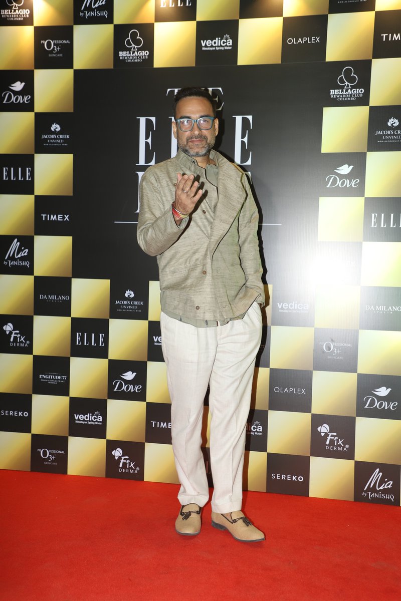 BollywoodH's tweet photo. Pankaj Tripathi brings his signature charm and understated elegance to the red carpet at The ELLE List 2025! A true legend of versatility and style, he’s owning the moment with effortless grace. 
.
.
.
.
#PankajTripathi #ELLEList2025 #RedCarpetStyle #TrueIcon https://t.co/my3YoTGUxL