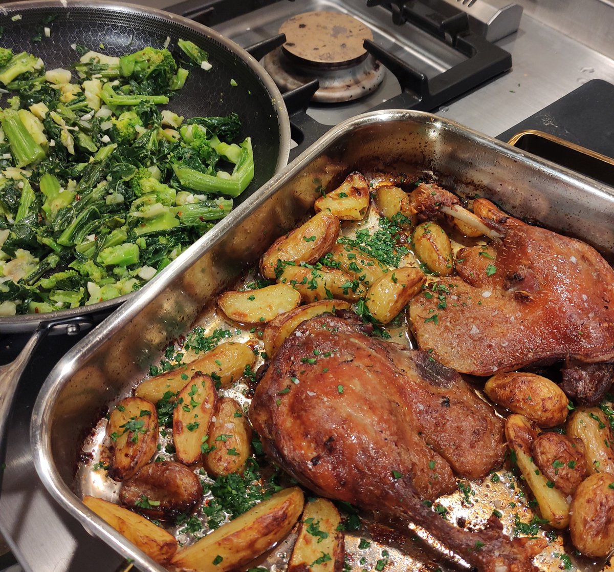 Friday night dinner... Confit de canard with little potatoes, rapini with lemon, garlic and chilli. Twenty-five minutes from walking in the door to putting it on plates.
