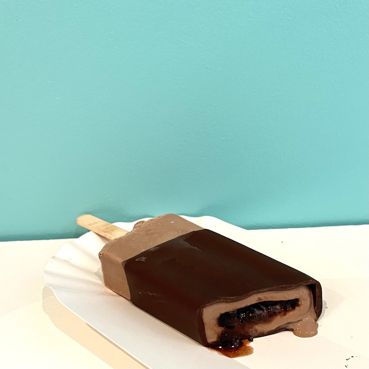 The Pop Stand presents their Chocolate fudgesicle filled with black garlic cherry compote, and dipped in semi sweet Belgian Chocolate. They will be available with, or without the added dipped chocolate. This will be available tomorrow at the Black Garlic &amp; Chocolate Affair!