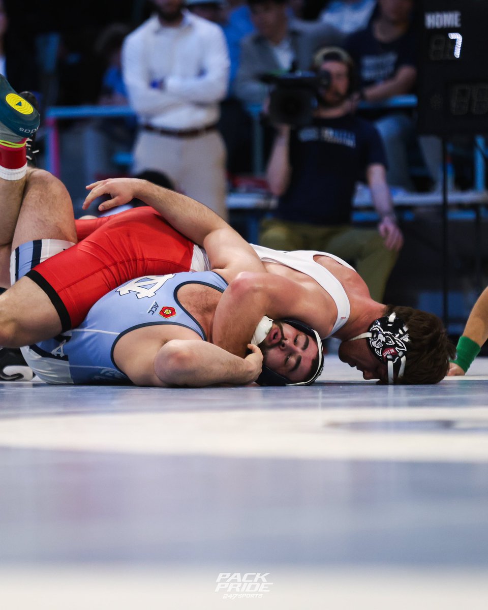 PackPride's tweet photo. Saved the best for last. Isaac Trumble and Vince Robinson seal the deal and lift the Wolfpack over the Tar Heels 19-16 https://t.co/CxsiSXiUY7