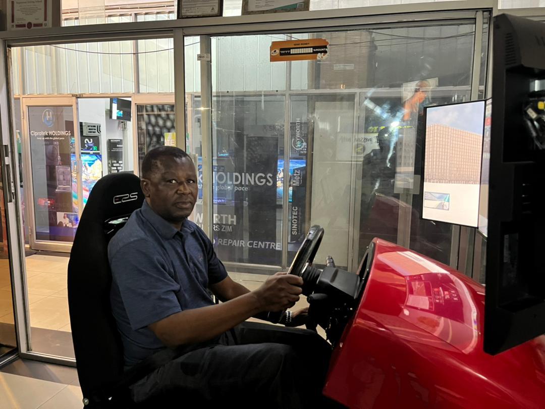 safetydrivngsch's tweet photo. Collaborating with regulators to shape future of Road Safety @tscz1 Traffic Safety Council of Zimbabwe MD Mr M Munodawafa visited us to appreciate our inclass driving lessons (driving simulator). #RoadSafety #safetydrivertraining #safetyfullpackage https://t.co/XqqcQGuwUP
