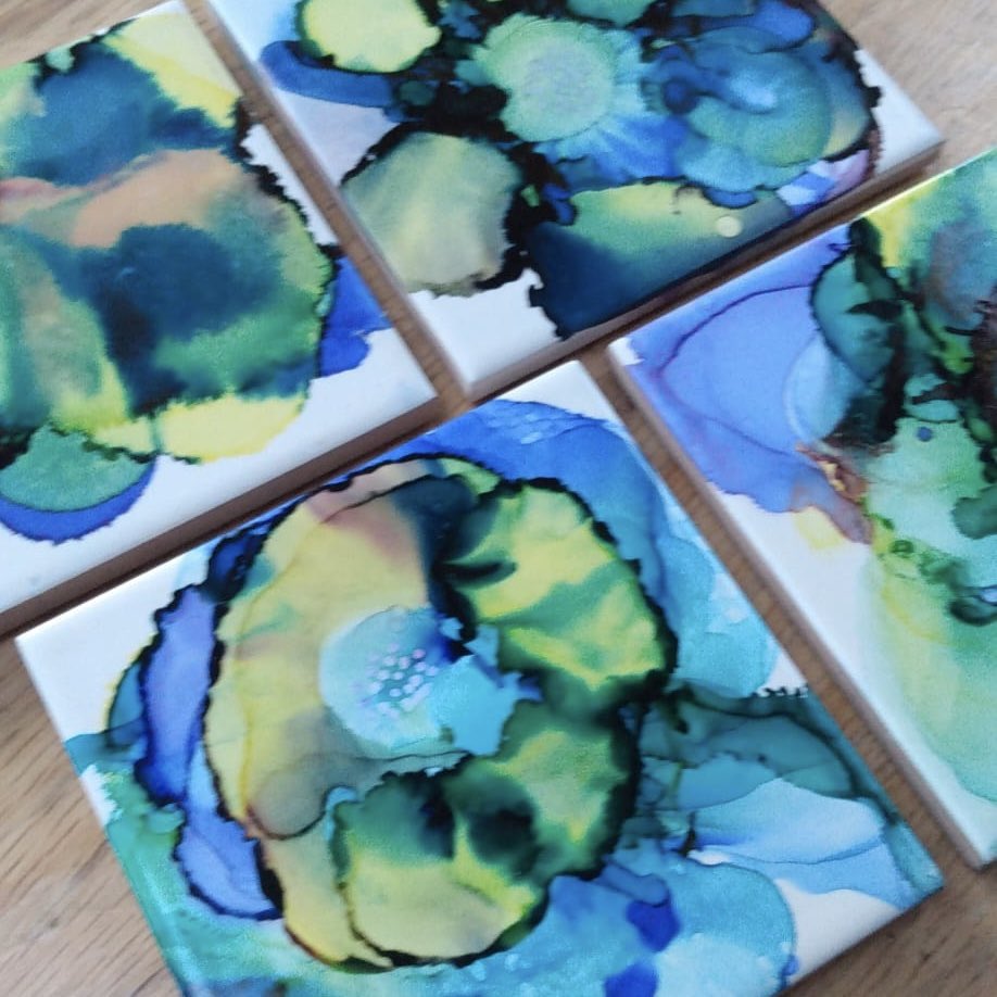 SamBP2's tweet image. Here’s a few examples of the coasters made by young people and adults made at the Alcohol Inks workshop delivered recently at The Lamplighters Pub, Bristol.