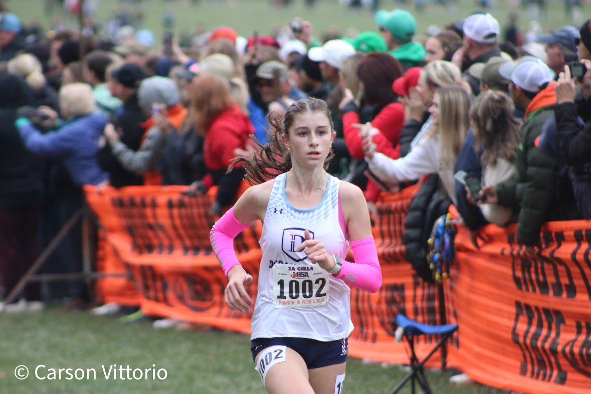 Emily Stecky of DePaul College Prep runs a new IL#1 in the 800m with her 2:15.55 at the #ConradWorrill25