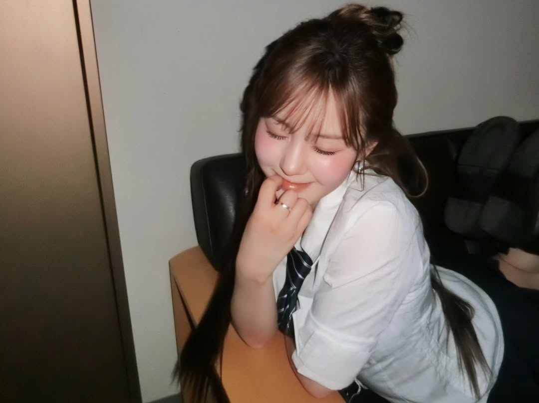 Bathed in soft luminescence, where fleeting moments blend with quiet reverie. A gaze laced with enigma, a smile kissed by moonlight—an ephemeral masterpiece of serenity, draped in the elegance of an untold story.