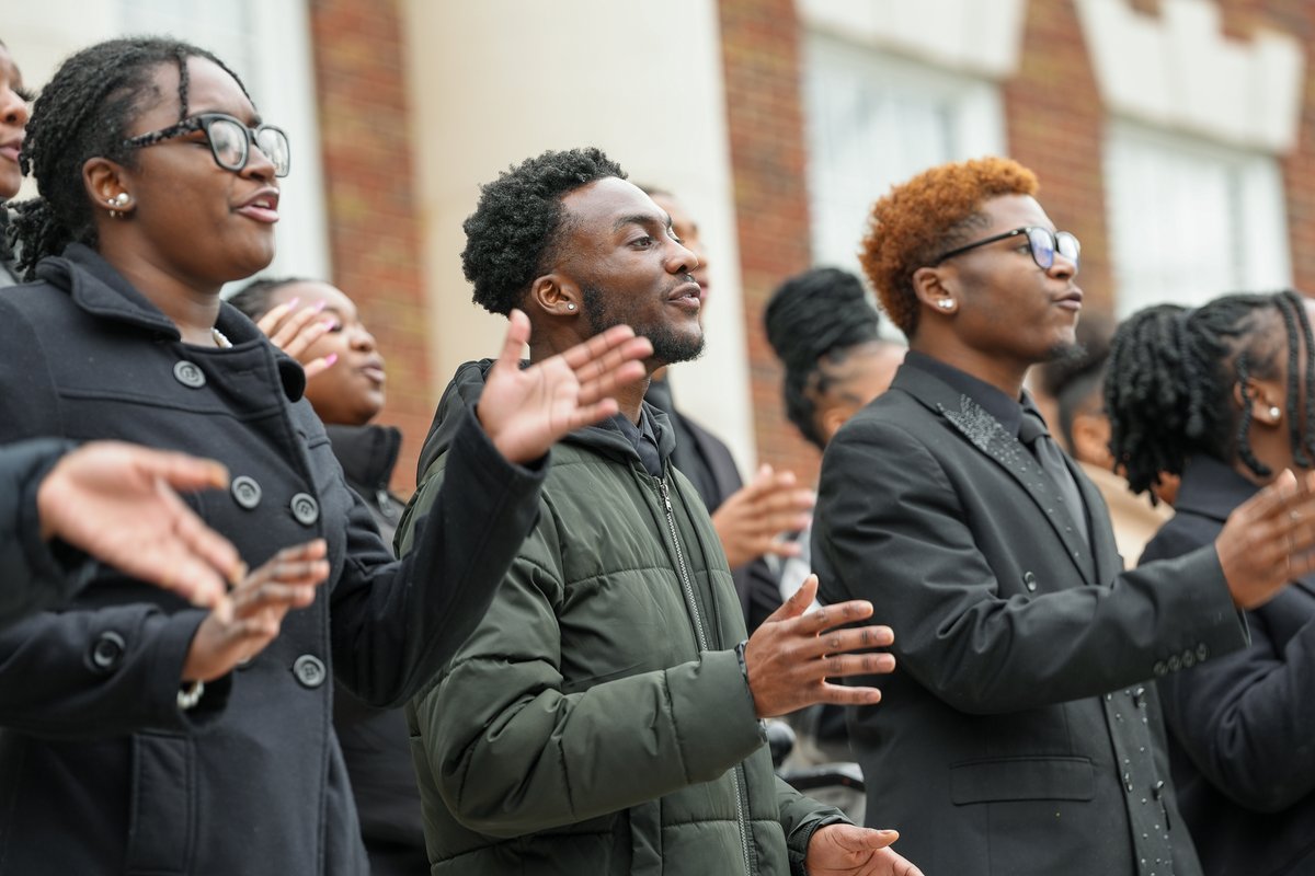 GCSchoolsNC's tweet photo. #GCSCelebrates | This February 1 marks the 65th anniversary of the Woolworth Sit-Ins, a peaceful protest where the A&amp;T Four walked to sit at the segregated Woolworth Lunch Counter. Members of the GCS community gathered to honor their legacy at their monument for a wreath-laying. https://t.co/aN3Wev23HV