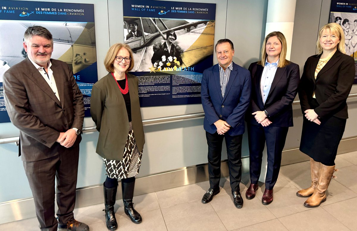 Nieuport's tweet photo. Our President and CEO @NeilPakey, Chief Strategy and Development Officer Jennifer Quinn and Chief Operating Officer Eve Wiggins were delighted to welcome Consul General of Ireland in Toronto Janice McGann and Chairman of the @CanadaIrelandFd Mark Purdy to @bbishopairport today. Together, they unveiled our latest honouree in Nieuport Aviation’s Women in Aviation Wall of Fame: Irish Aviator Lady Heath. The gathering was also an opportunity to celebrate St. Brigid’s Day, which marks the beginning of spring. St. Brigid is the patroness saint of Ireland who founded the important abbey of Kildare and several other convents of nuns.

Lady Heath, born Sophie Pierce-Evans from humble   beginnings in Limerick in 1896, achieved fame as the first person—woman or   man—to fly solo from South Africa to London, a remarkable journey that she   accomplished in an open-air cockpit. The 10,000-mile flight was fraught with challenges, including 100-degree heat that caused heatstroke, an air crash in   Zimbabwe, and even false reports of her death.
Toronto has a long history of connection with Ireland.   Just outside YTZ’s mainland pavilion, Ireland Park commemorates the Irish Famine migrants who arrived on Toronto’s shores between 1846 and 1849. We   include Lady Heath in homage to our Irish neighbours, to the @CanadaIrelandFd and to the Corleck Building near the airport.
To learn more about Lady Heath, you can view a digital   profile produced by the @RCAF_Foundation by visiting https://t.co/ARybqqVM6c. And the next time you’re through the airport, don’t forget to visit the wall of fame on the second floor of the passenger terminal!

#aviation #airports #history #ytz #avgeek #LáFhéileBríde #StBrigidsDay #Ireland #TeamIrelandinCanada
cc @IrlCGToronto @jennquinn13