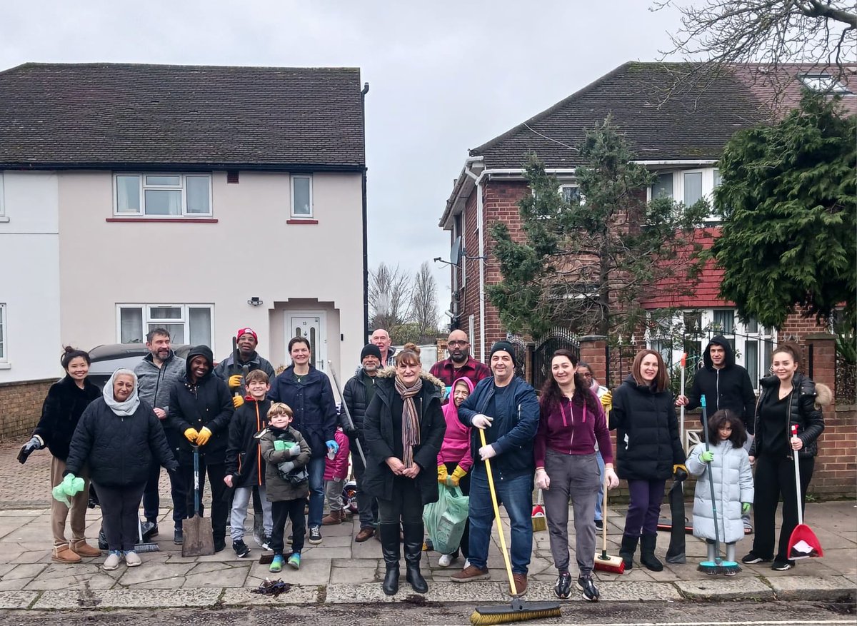 Iveagh Avenue residents out with brushes to clear leaves as Ealing council neglecting this area,cutting services but demanding an extra 5% in council tax from April .
