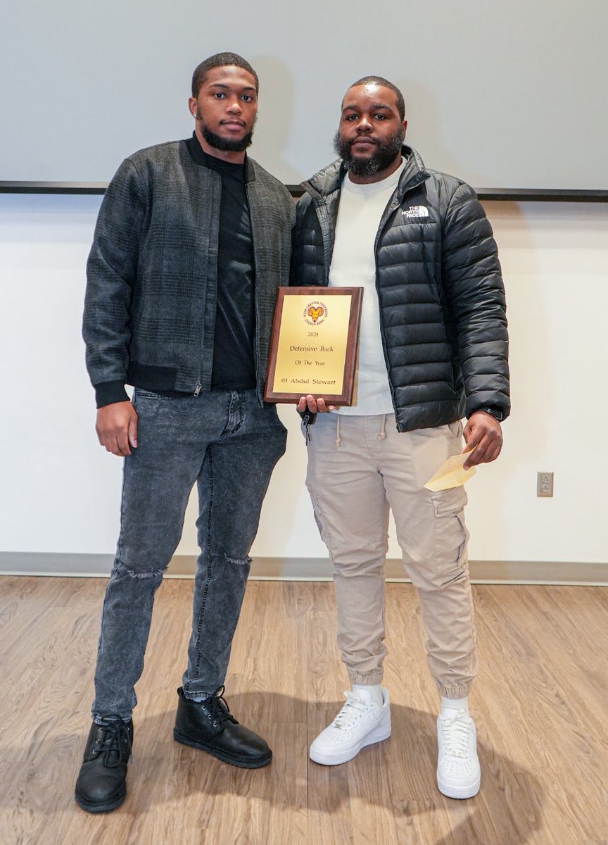Kevin Malone (Class of 2106) presented the Defensive Back of the Year Award to senior Abdul Stewart.