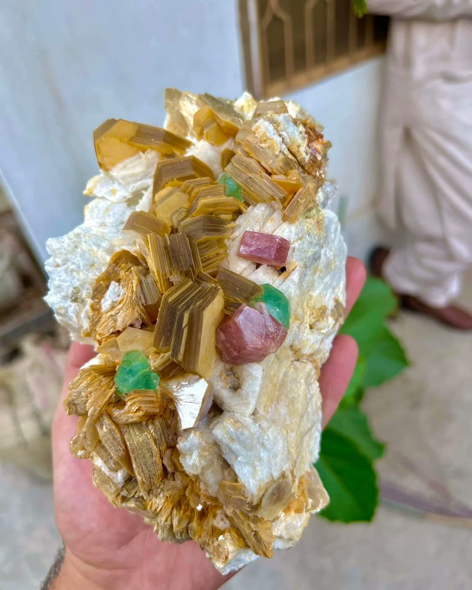 Lovely combination of pink apatite with green fluorite and golden muscovite mica specimen

Photo by: usman.khan_minerals