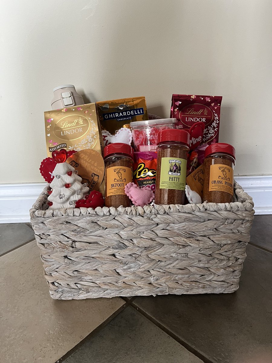 Picture for tomorrow's raffle. To be eligible, either place an order with me, or purchase 1 ticket for $1 or 3 tickets for $5. The basket contains various chocolates, Valentine's suckers, a water bottle, one of our beanies, sticker, and a bottle of each of our seasonings.