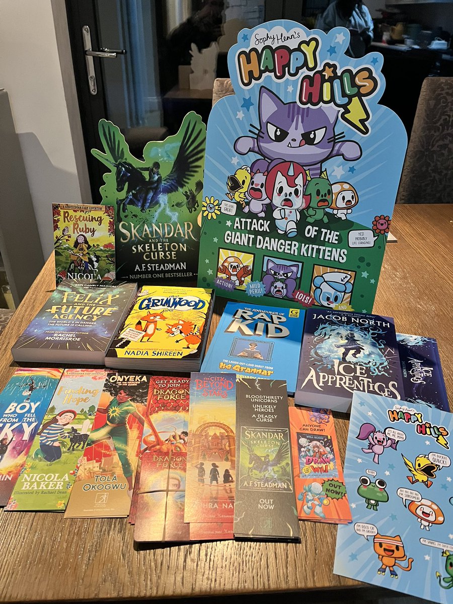 What a day! Lots of great merch to get into school &amp; our library on Monday. Lovely to catch up again with <a href="/karen_wallee/">Wallee</a> <a href="/MissNCleveland/">Miss Cleveland 📚☕️</a> <a href="/GetKidsin2Books/">Get Kids into Books</a> &amp; see <a href="/BookSuperhero2/">LibraryGirl&BookBoy (Jo)</a> <a href="/OctoberJonesCo/">October Jones</a> 📖 Thanks again to the <a href="/simonkids_UK/">Simon & Schuster Children's Books</a> team for giving up your Saturday- you are fantastic!