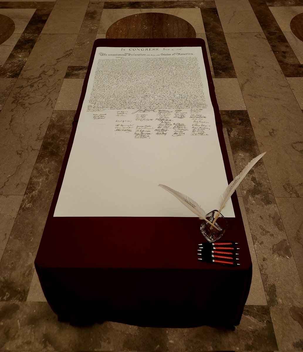 USNatArchives's tweet image. A replica of the Declaration of Independence awaits our young John Hancocks at the #ArchivesSleepover! 

Crimora, age 11, is the first to sign and has practiced her #cursive! 🙌