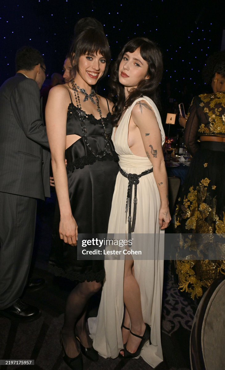 Clairo and Margaret Qualley at the Pre-Grammy Gala tonight 🩷💐