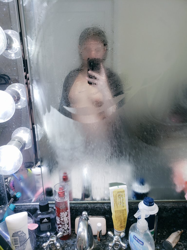 Idk why but I really like this photo, something about the fogged up mirror combined with visible booba that could have been meant to be covered by fog, it also makes my boobs look bigger (they're just shy of like a b cup now)