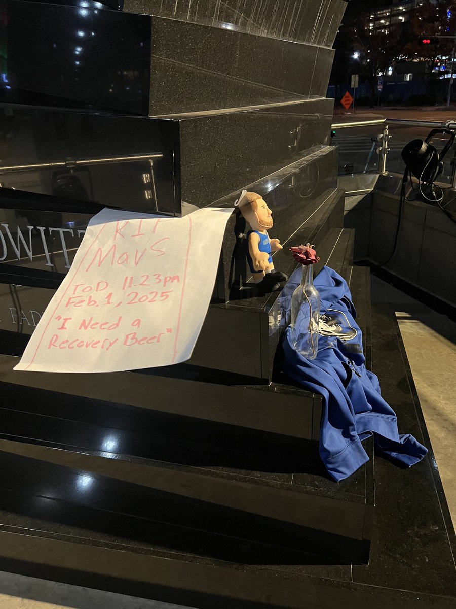 MavsMuse's tweet photo. The Dirk statue has become a Mavs fan memorial https://t.co/IRSYqU8Sz0