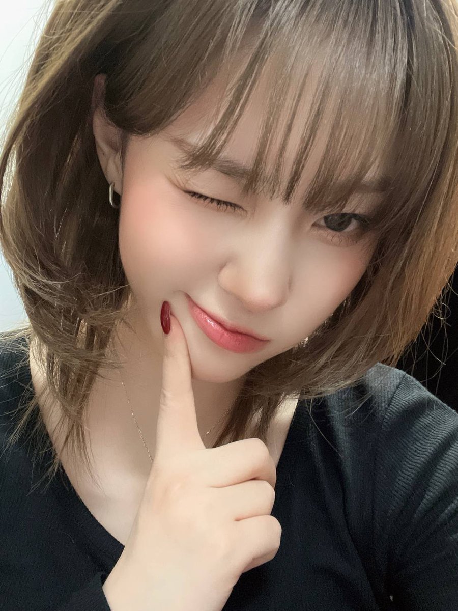 A playful smirk, a gaze kissed by stardust—where charm meets mystery, and elegance whispers through soft hues. A fleeting moment wrapped in allure, like moonlight dancing upon the tranquil ripples of a midnight dream.