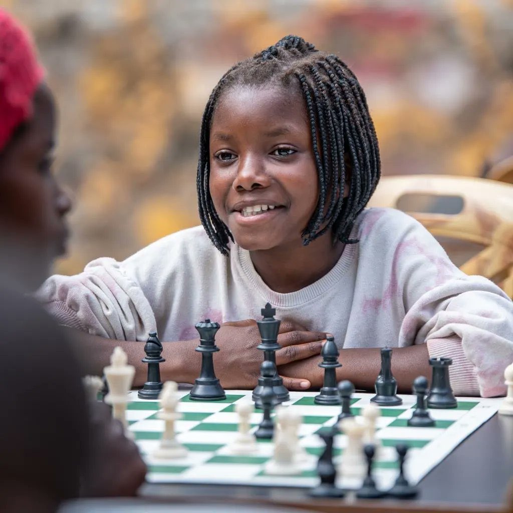 Her name is Ishala Balolage. She is young girl who 1st learned chess at the Nakivale Refugee Settlement in Uganda. She is from the Congo, but due to conflict was forced to flee her country. For so many, opportunities are scarce, it’s hard to be seen, when so many are suffering.