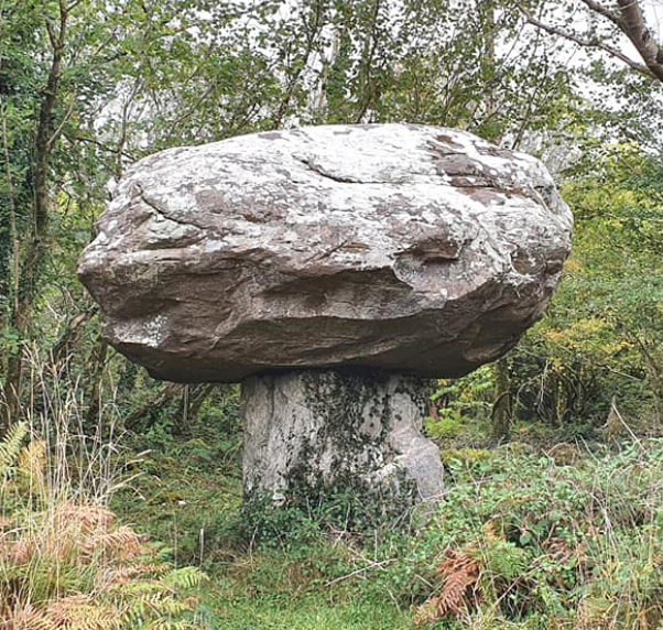 Carraig an Cappeen (the rock with a hat), near Kenmare, Co. Kerry, a huge red sandstone erratic boulder on top of a 6ft-high limestone pillar – like a giant, c16,000-year-old mushroom. When the Ice Age retreated, the boulder was left sitting on the limestone base.