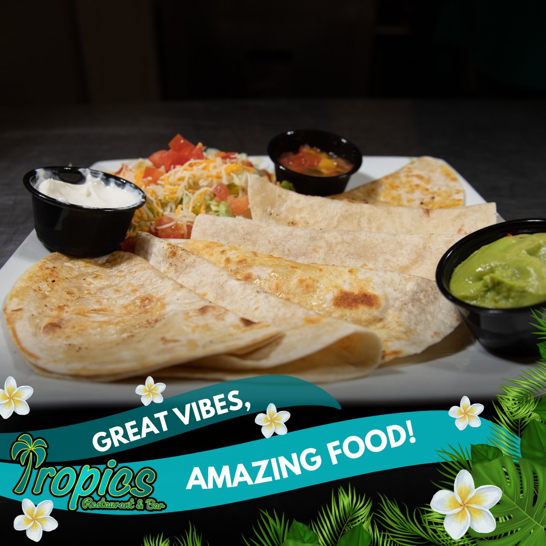 Ready for a mini-vacation? 🌞🍹 Experience a taste of the islands at Tropics tonight! #WVFoodies #TropicalDining #IslandVibes