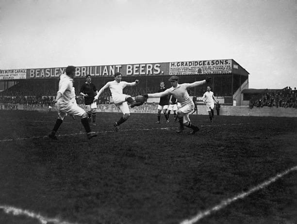 Woolwich Arsenal goalkeeper Harold Crawford reaches for a shot from a Manchester City striker during a game at Arsenal’s Plumstead ground in South London, 2nd November 1912. Photo: Getty Images