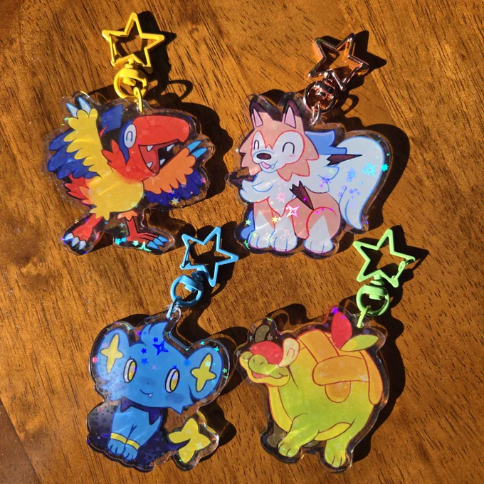 it's time! poké stickers and keychains (along with some other goodies) are available in my shop! link in bio.