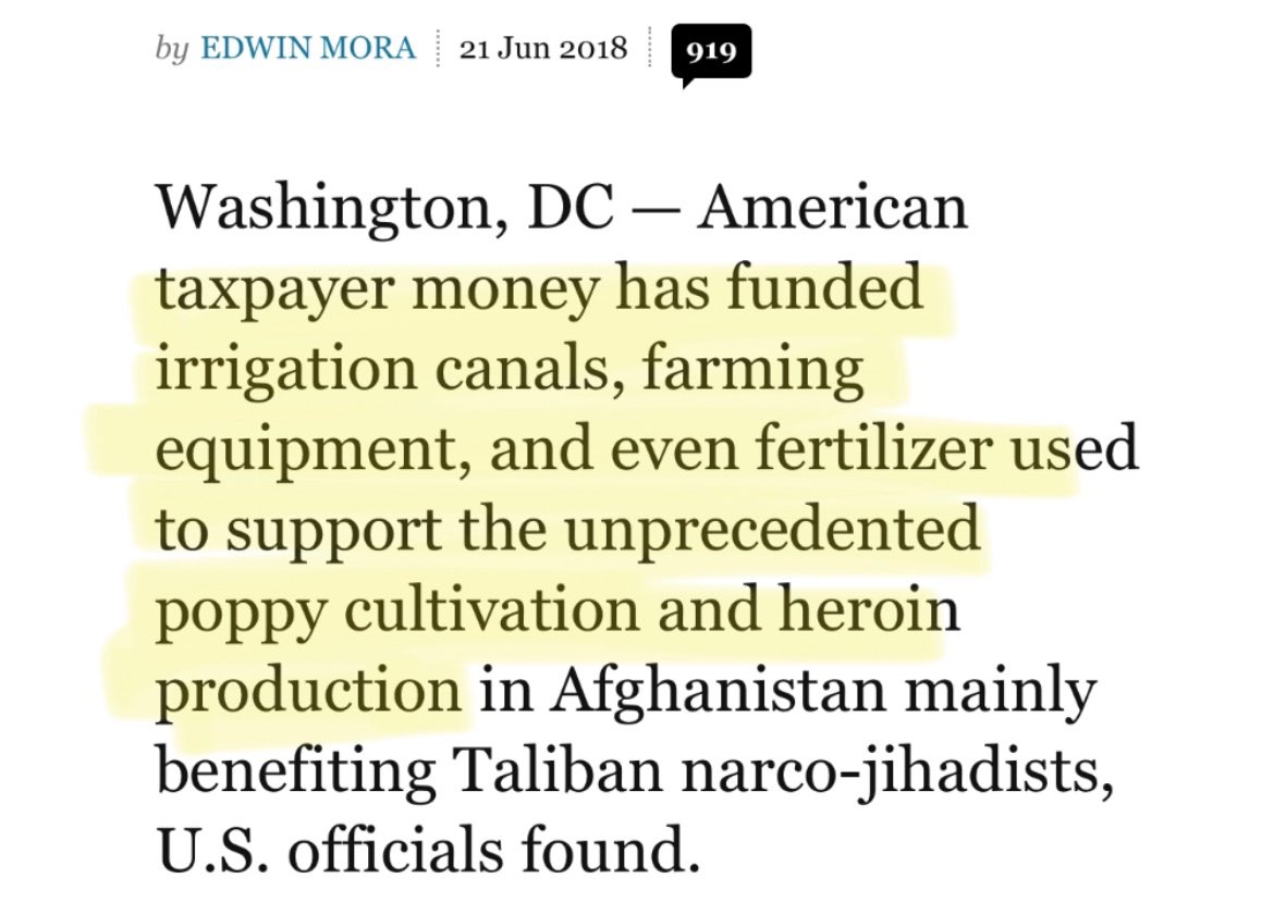 Why was USAID funding the production of heroin in Afghanistan?