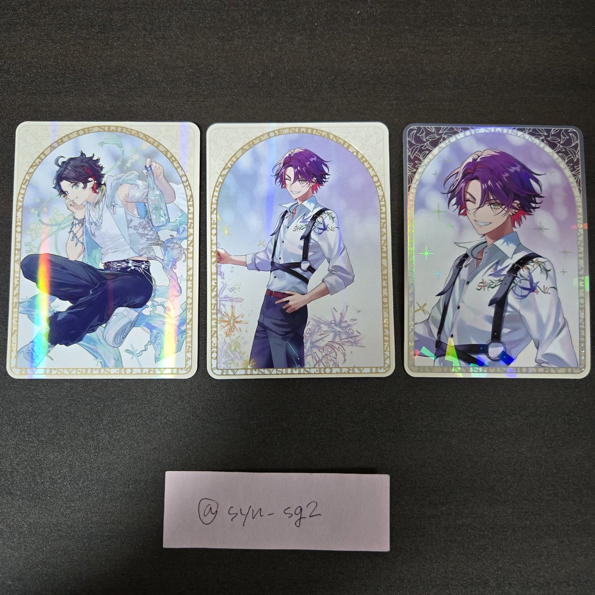 syn_sg2's tweet photo. 【交換】にじさんじ/7周年/7th Anniversary/ART OF NIJISANJI/ランダムチェキ風カード/ランダムコレクションカード/コレカ/OS特典/箔押しホロクリアカード/オーロラステッカー

譲)画像1～3枚目 
求)画像4枚目

郵送希望です
検索からもお声がけお待ちしております https://t.co/ejhf6ASbdf