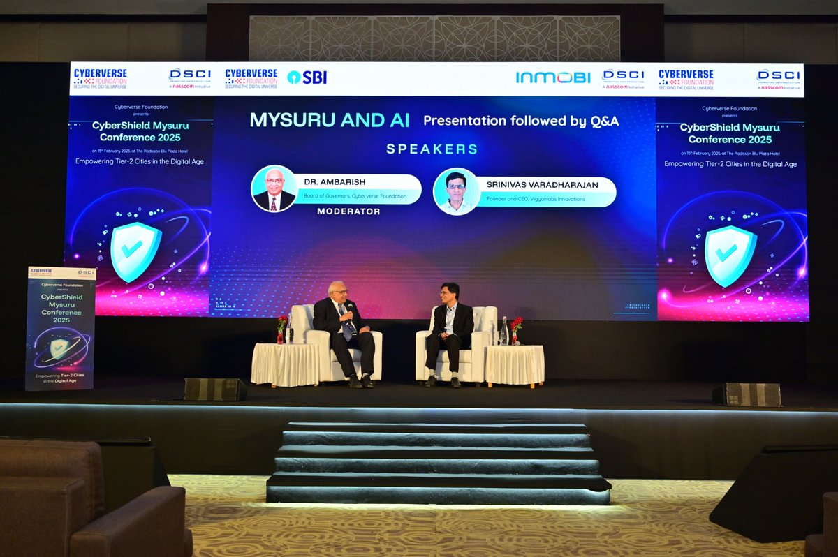 MCyberverse's tweet photo. At CyberCloud Mysuru 2025, Srinivas Varadarajan (CEO, Vigyanlabs) discussed AI innovation with Ramasastry Ambarish (Dean, MYRA). He highlighted Deepseek’s impact, air-chilled server cooling, and an AI-first approach: "We use AI to build the cloud, not the other way around." https://t.co/dZ6qqNn56c