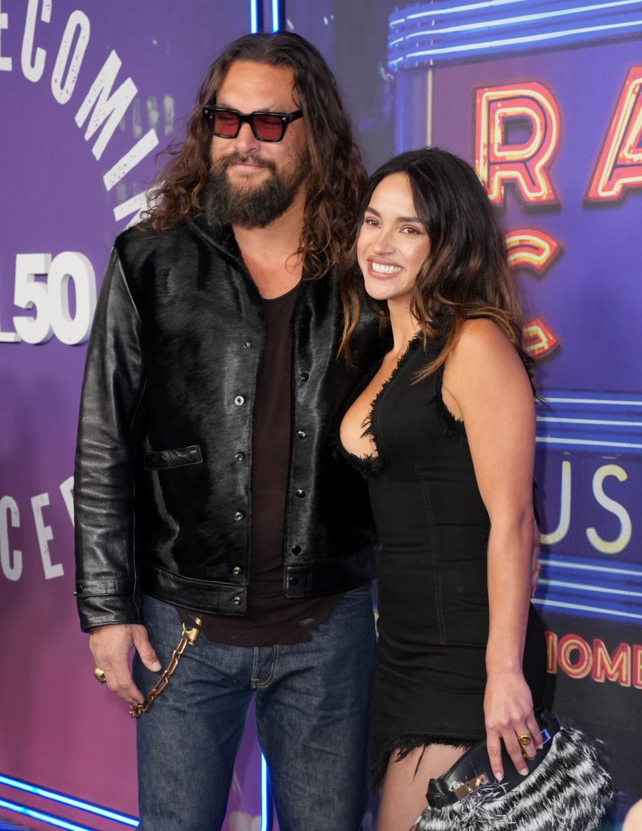 cinebuz's tweet photo. Adria Arjona &amp; Jason Momoa at the Peacock's "SNL 50: The Homecoming Concert" https://t.co/aebfBYrK79