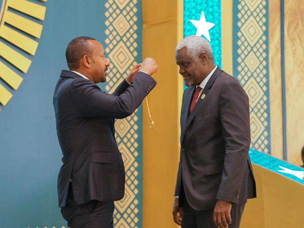 AbiyAhmedAli's tweet photo. As we welcome the new Chairperson of the African Union, I thank @AUC_MoussaFaki, outgoing Chairperson of the African Union, for his leadership and friendship over the past years. 

Ethiopia thanks you for your dedicated service to Africa. We heartily wish you the best in your endeavors.