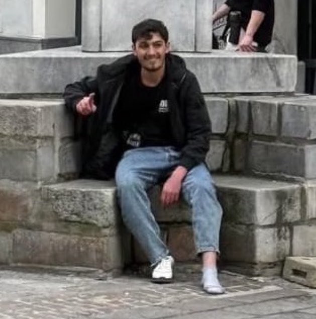 Right hand finger pointing up.

Remember this symbol and what it means.