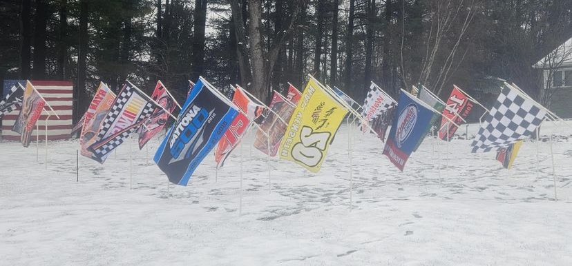 lorirobertjoel's tweet photo. @TheCW_Sports #CWNASCARChallenge 
Our Fan Cave is outdoors and indoors. This is half of our nascar flags. When we are at the track there is a ton more flags that will be displayed. Every year we visit the tents outside track to find more discounted flags from drivers 
to add to our collection. https://t.co/PGX67DCxvH