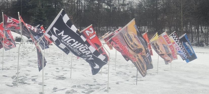 lorirobertjoel's tweet photo. @TheCW_Sports #CWNASCARChallenge 
Our Fan Cave is outdoors and indoors. This is half of our nascar flags. When we are at the track there is a ton more flags that will be displayed. Every year we visit the tents outside track to find more discounted flags from drivers 
to add to our collection. https://t.co/PGX67DCxvH