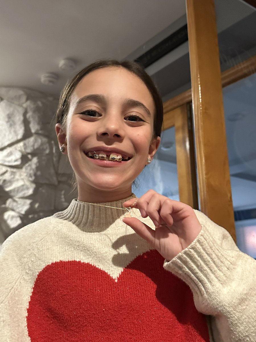 Toni1623's tweet photo. @DollyParton my daughter loves the @KendraScott necklace she got for Valentine’s Day! https://t.co/eQsDH05c9j