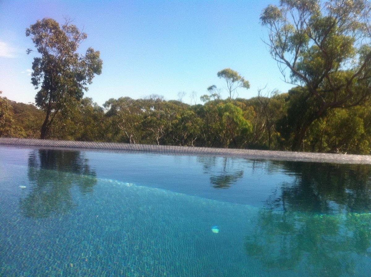 Splashing into a new season with a pool that shines! ✨🌊 #TileInspiration #WaterWonders