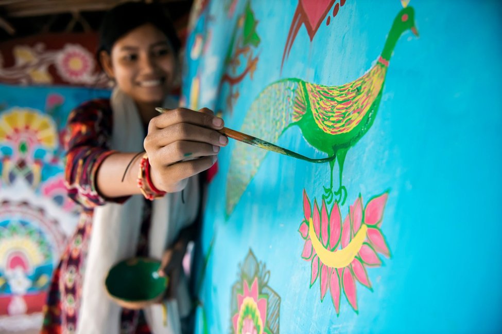 Tikoil is a small village located in the Nachole Upazila of Chapainawabganj in Bangladesh. All the women in the village are skilled painters, and to them, the walls and floors of every home serve as a canvas. 1/6