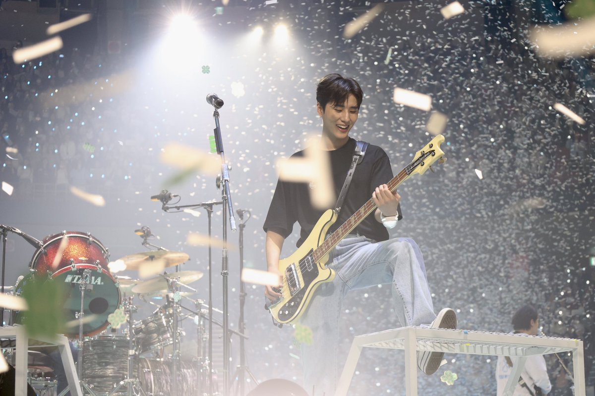 this picture of youngk surrounded by the confetti is so beautiful