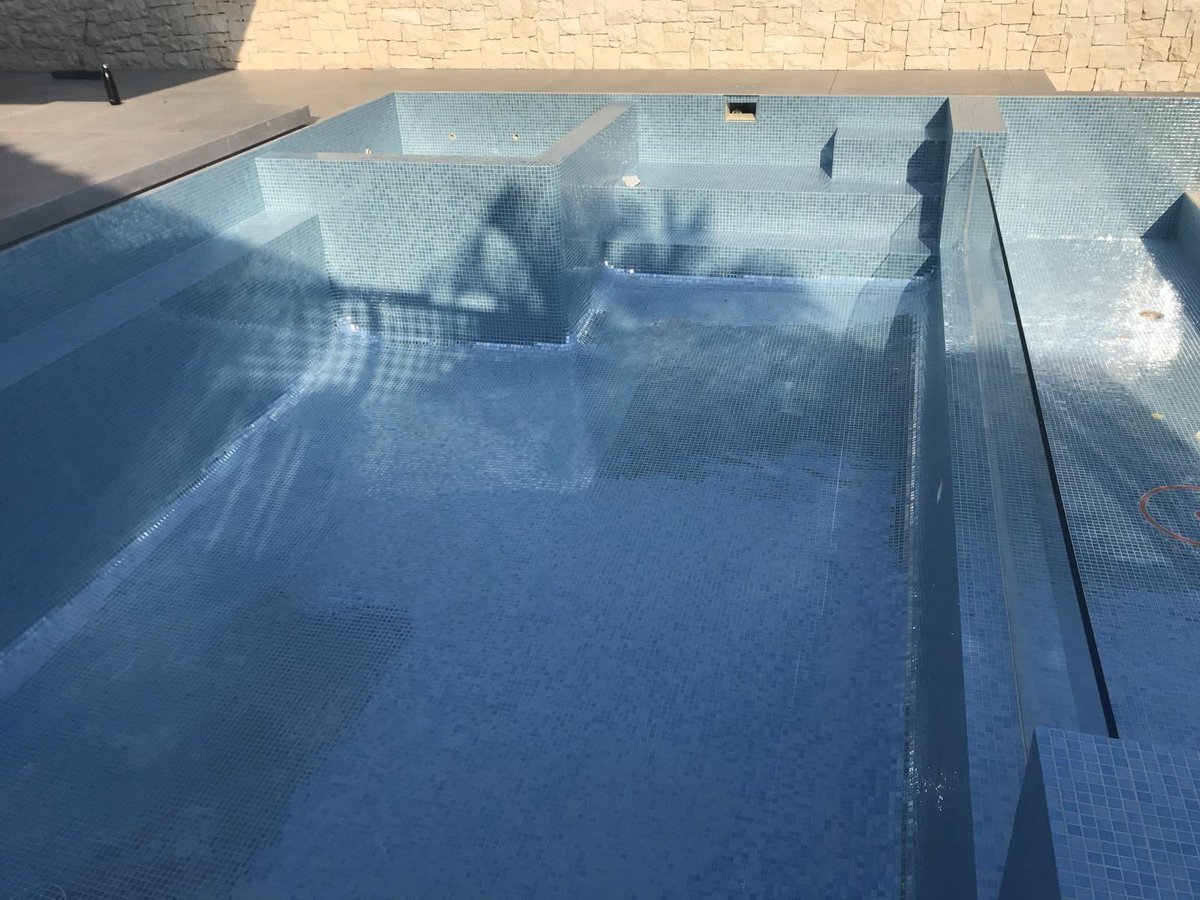 Every tile is a brushstroke in the masterpiece of your dream pool. Our commitment to precision and design excellence ensures that each project we undertake is both visually captivating and built to last. Trust us to turn your backyard into a luxurious getaway, one tile at a time.